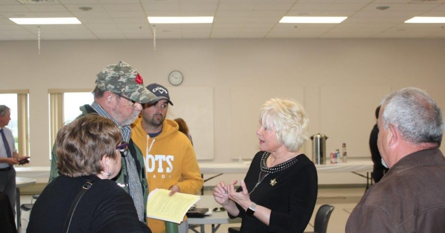 THANKING COMMUNITY FLOOD RELIEF VOLUNTEERS Cheryl Gallant speaks with Ed Scott andPhil Mallis at Renfrew County Flood Town Hall