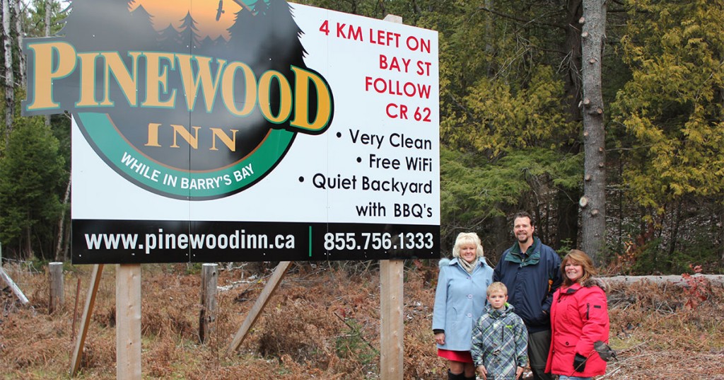 MP Cheryl Gallant with Pinewood Inn’s new highway signs